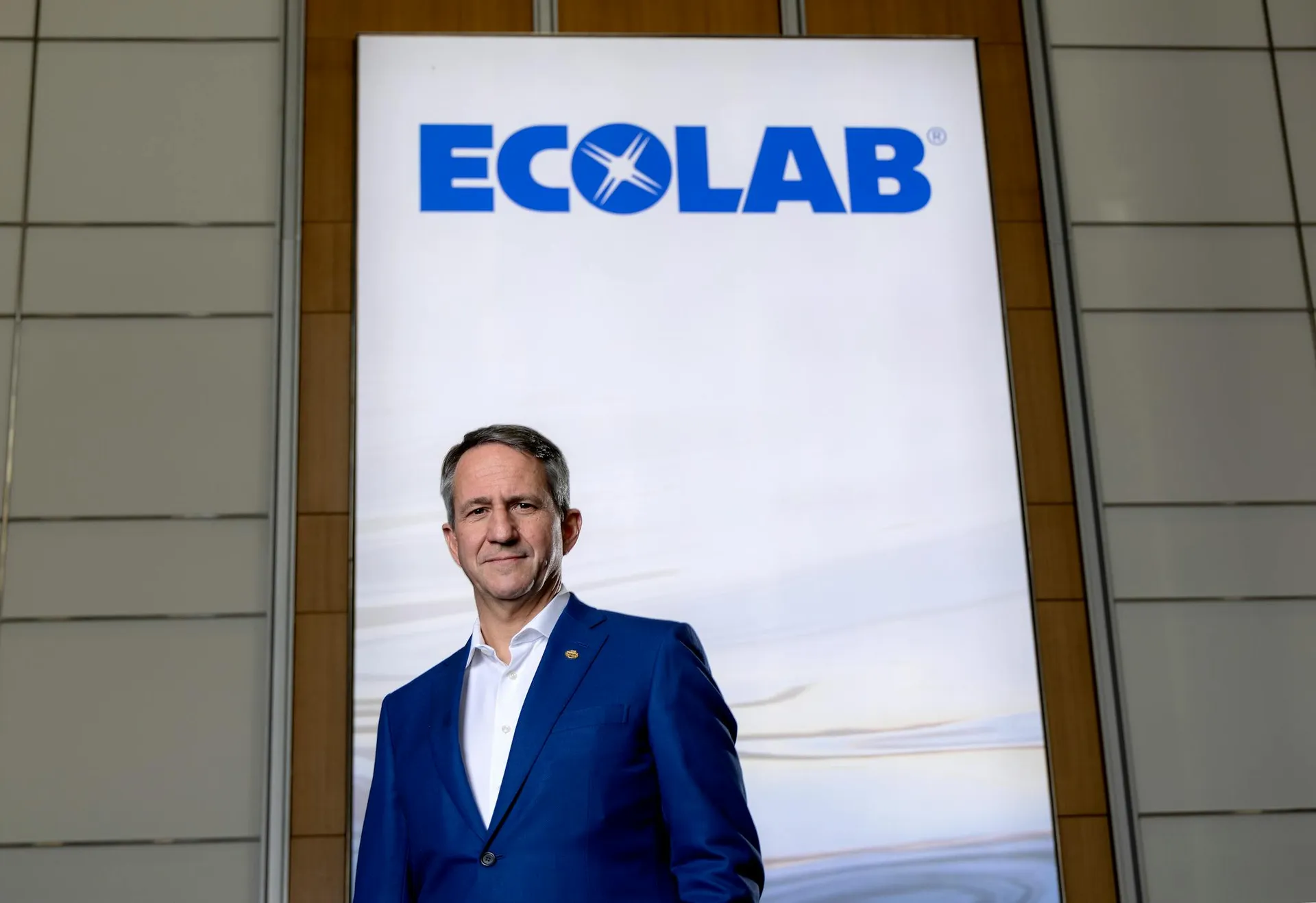 Ecolab CEO Christophe Beck at a press event discussing the company's expansion into AI data center cooling technology
