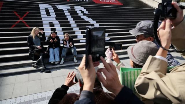 BTS fans gather at Gwanghwamun Square in Seoul ahead of the group's comeback concert on March 21, 2026
