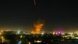 Smoke and flames rising from an area hit by airstrikes in Kabul, Afghanistan, March 16, 2026