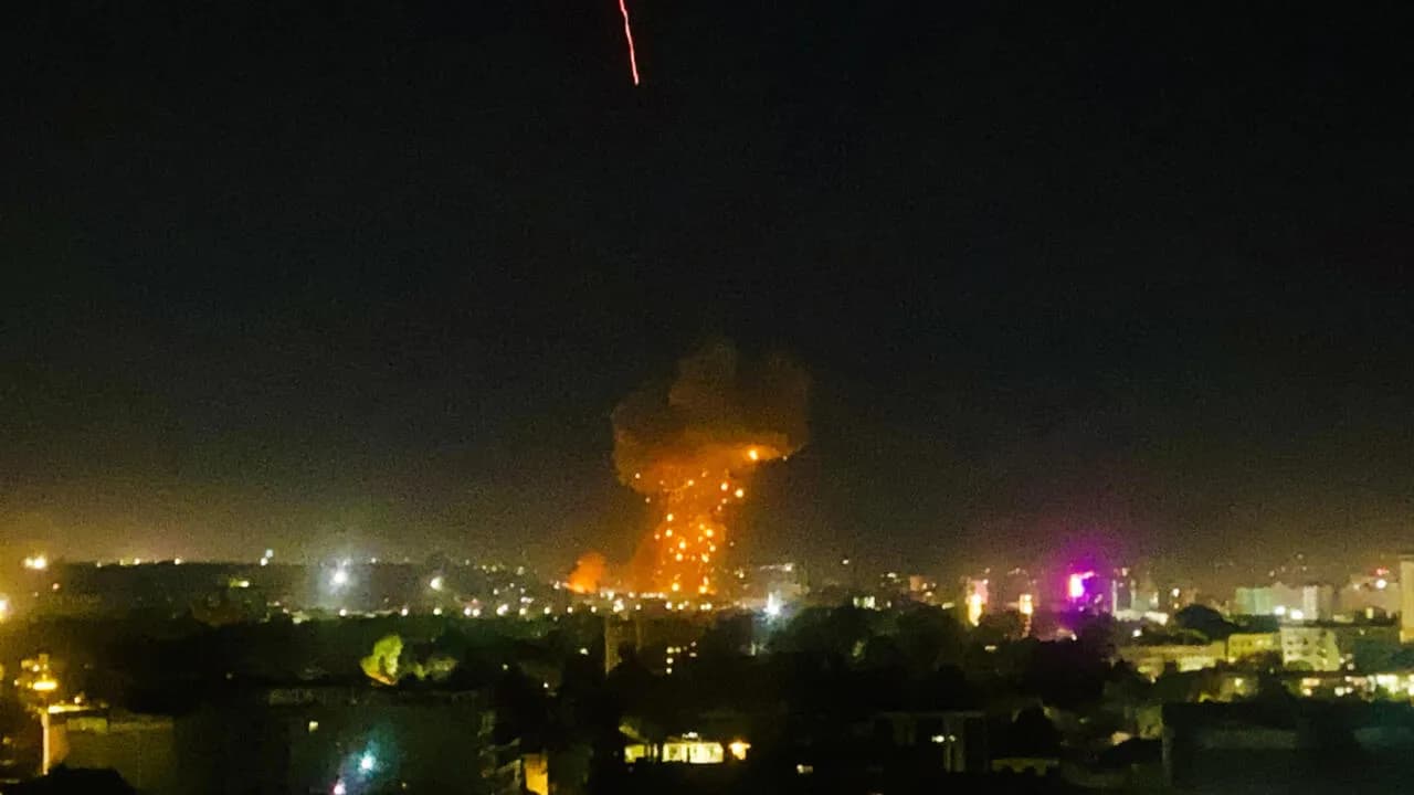 Smoke and flames rising from an area hit by airstrikes in Kabul, Afghanistan, March 16, 2026