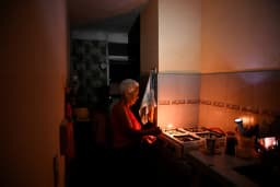 A resident in Havana during a blackout as Cuba's national electric grid collapsed on March 16, 2026