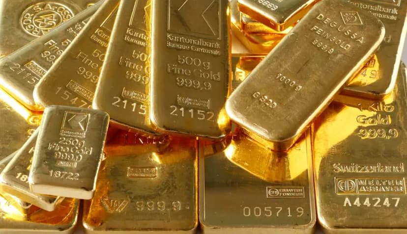 Gold bars on display following the Federal Reserve's March 2026 rate decision. Photo: Arnd Wiegmann / Reuters