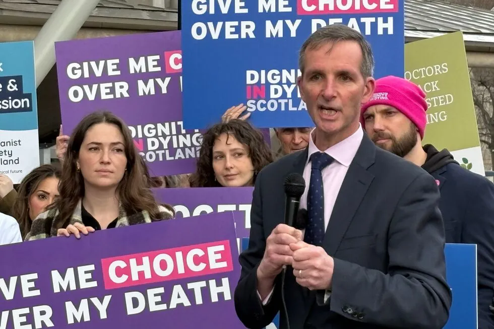 Liberal Democrat MSP Liam McArthur joins a rally of supporters outside the Scottish Parliament in Edinburgh ahead of the assisted dying vote, March 17, 2026