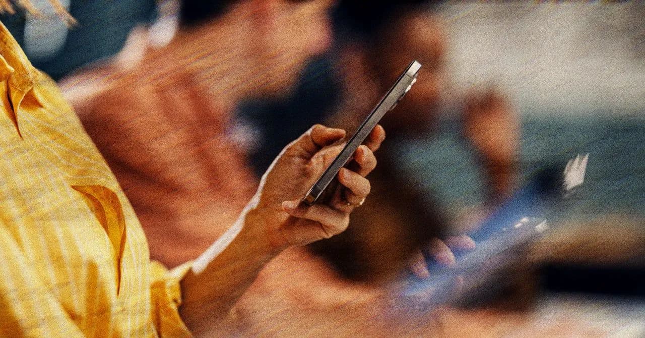 iPhone held in hand displaying security lock screen, illustrating the DarkSword exploit vulnerability affecting hundreds of millions of iOS 18 devices