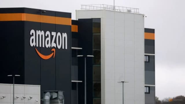 Amazon logo at the company’s logistics center in Bretigny-sur-Orge near Paris, photographed by Reuters photographer Stephanie Lecocq