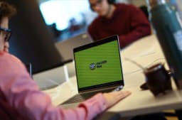 An employee works at MercadoLibre offices in Buenos Aires in a Reuters photo illustrating the company behind Mercado Pago and Mercado Coin