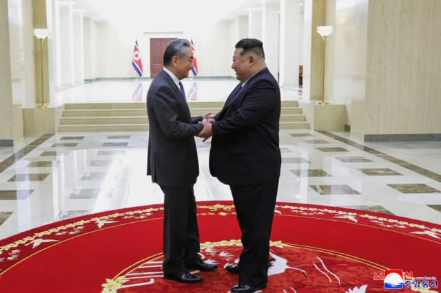 North Korean leader Kim Jong Un meets Chinese Foreign Minister Wang Yi in Pyongyang on April 10, 2026