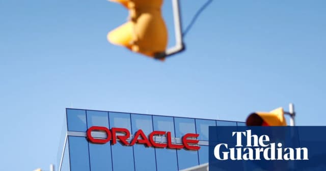 Oracle office building in Arlington, Virginia, photographed as reports say the company is cutting jobs while increasing spending on AI infrastructure