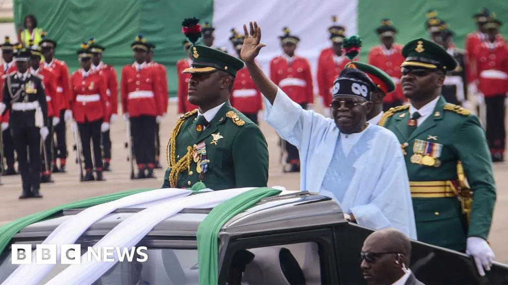 President Bola Tinubu waves during a presidential parade at Eagle Square in Abuja in a 2024 file image.