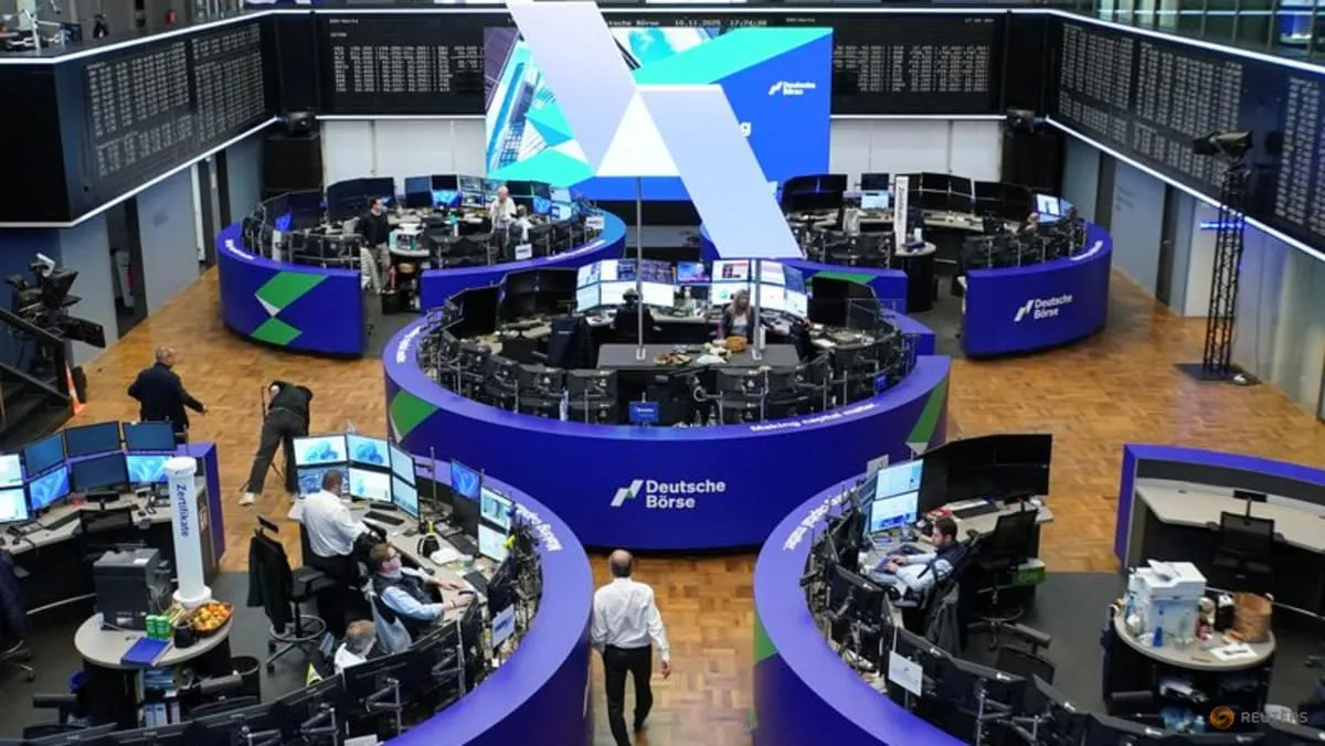 The trading floor of Deutsche Boerse in Frankfurt with electronic market boards and workstations visible.