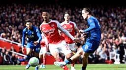 Bournemouth midfielder Alex Scott scores against Arsenal at the Emirates Stadium in London