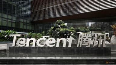 Tencent logo mounted on the exterior of the company headquarters in Shenzhen.