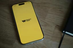 Street-level photo illustrating Western Union branding as the company launches its USDPT stablecoin on Solana.