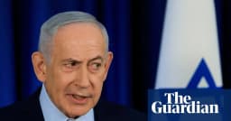 Benjamin Netanyahu speaks at a news conference with an Israeli flag behind him