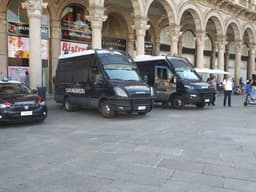 A Carabinieri police vehicle parked on a street in Milan