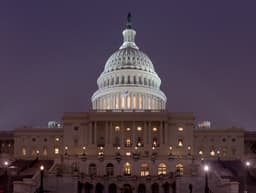 The United States Capitol building illuminated at night in Washington, D.C.
