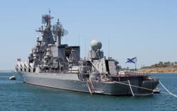 Russian guided-missile cruiser Moskva at sea, representative of the naval power Russia has threatened to deploy to protect its sanctioned shadow fleet tankers from European seizure operations