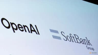 SoftBank and OpenAI logos displayed at a business AI event in Tokyo in a Reuters file photo