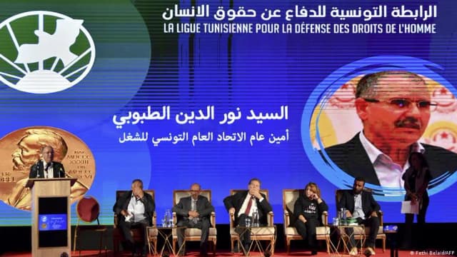 Tunisian President Kais Saied at a signing ceremony in Beijing in a file photo used with coverage of Tunisia’s suspension of the Tunisian League for Human Rights