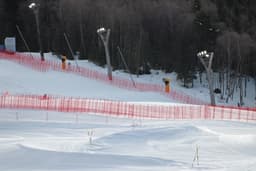 Franjo von Allmen of Switzerland racing the men's downhill at the 2026 Milano Cortina Winter Olympics on the Stelvio piste in Bormio