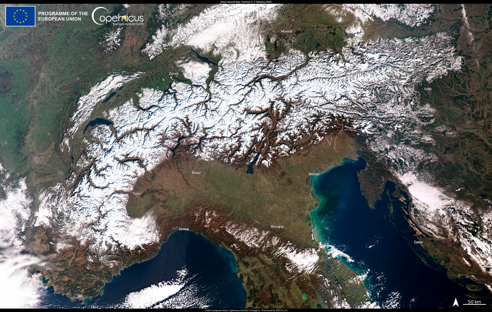 Heavy snowfall and avalanche conditions in the Alps, with snow-covered mountain slopes showing the treacherous terrain that has claimed 28 lives this winter season