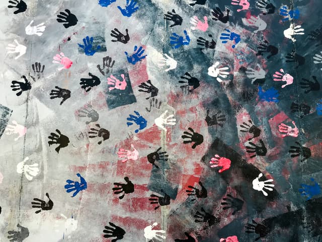 A colourful graffiti-covered section of the Berlin Wall at the East Side Gallery open-air memorial in Berlin