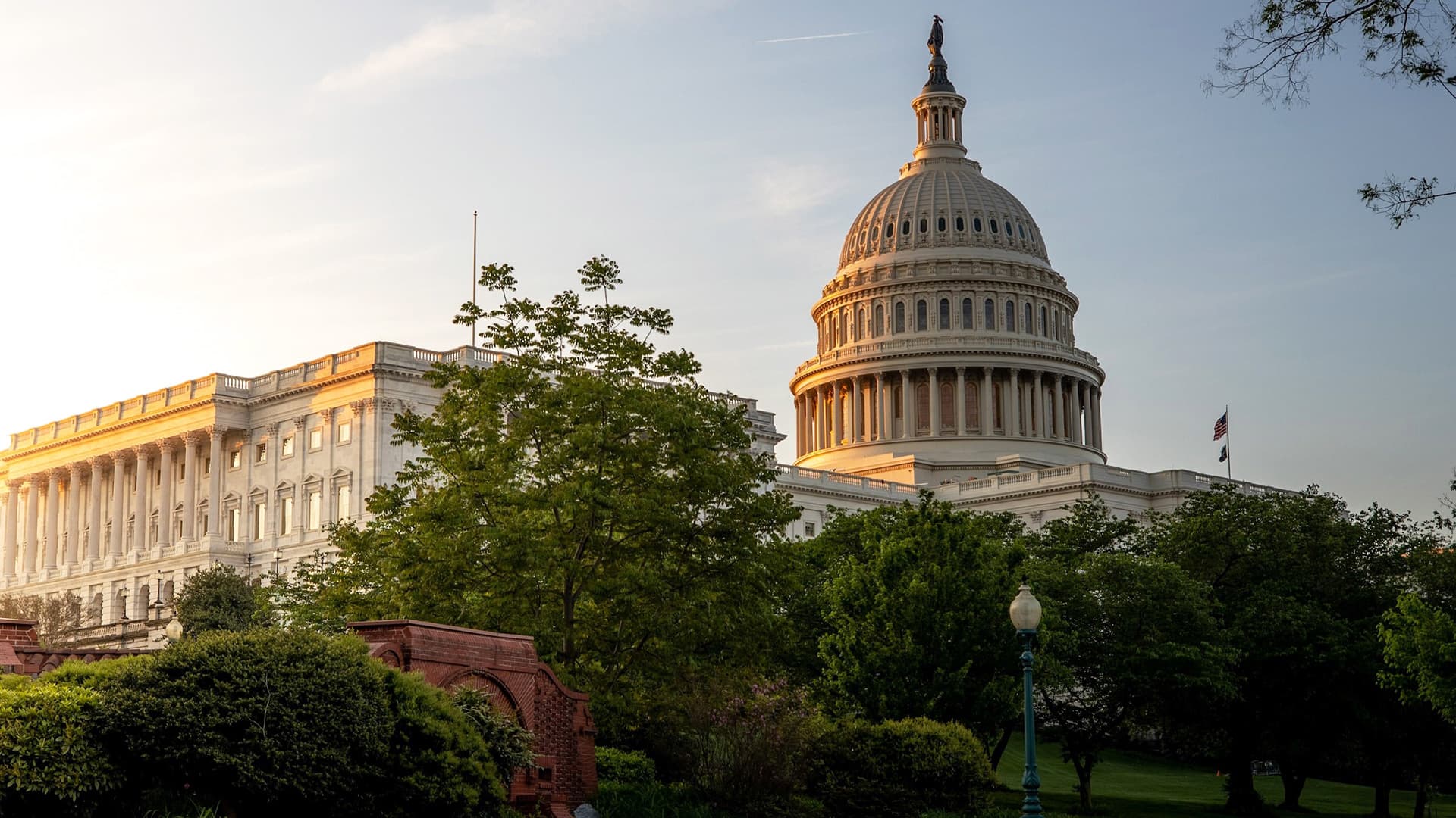 The United States Capitol building in Washington DC at sunrise, viewed from the east side